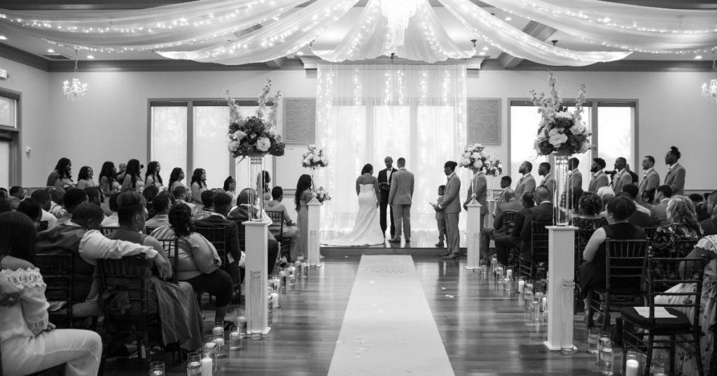 Burrage exchanging vows at the alter