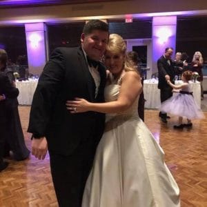 Colleen Gallagher embracing her son at wedding reception son