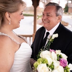 Mr and Mrs Gallagher wedding picture on a golf cart